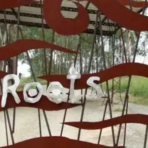 David Rossouw — View through gate back to gatehouse - forum homini roots resturant